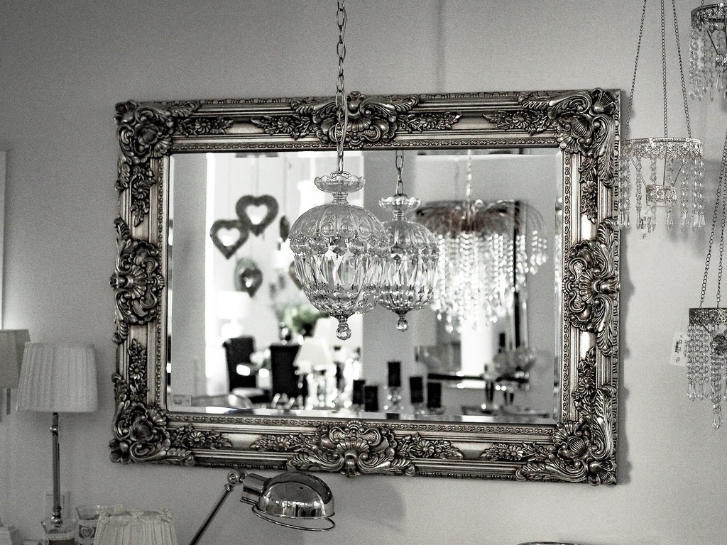 Facetslipt speil m/ramme i gyldendt sølv, 116 x 85 cm.